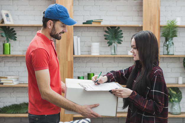 pretty-woman-signing-receiving-parcel_23-2147801290.jpg